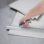 Nóż Profi z ostrzem trapezowym Wolfcraft, z funkcją automatycznej wymiany ostrza