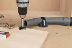 Uchwyt do montażu rury odkurzacza na blatach stołów Master, Wolfcraft