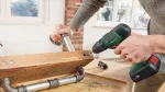 Wiertarko-wkrętarka udarowa akumulatorowa UniversalImpact 18V (2x1,5 Ah) + AL 1810 CV + 51 AC
