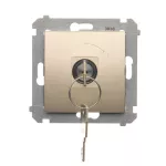 Simon 54 WMDL-0K01Px-044 Łącznik na kluczyk chwilowy – przycisk (moduł) 2 pozycyjny „0-I” styk N/O, 5 A, 250~. Możliwość wyjęcia klucza tylko w pozycji 0; złoty mat