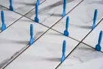 SYSTEM POZIOMOWANIA PŁYTEK BAZA PROSTA 2mm /100szt. PRO-LEVELING
